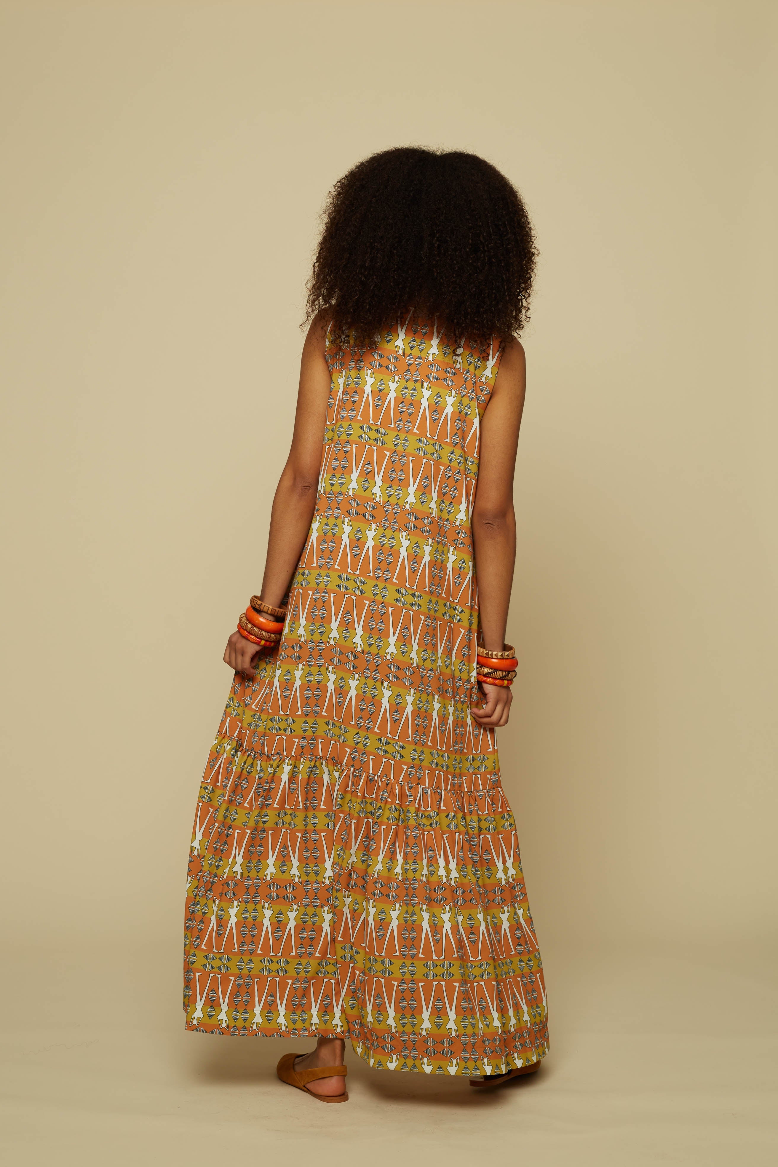 HENIOCHUS MAXI DRESS (BROWN GEO HUMAN FIGURE PRINT)