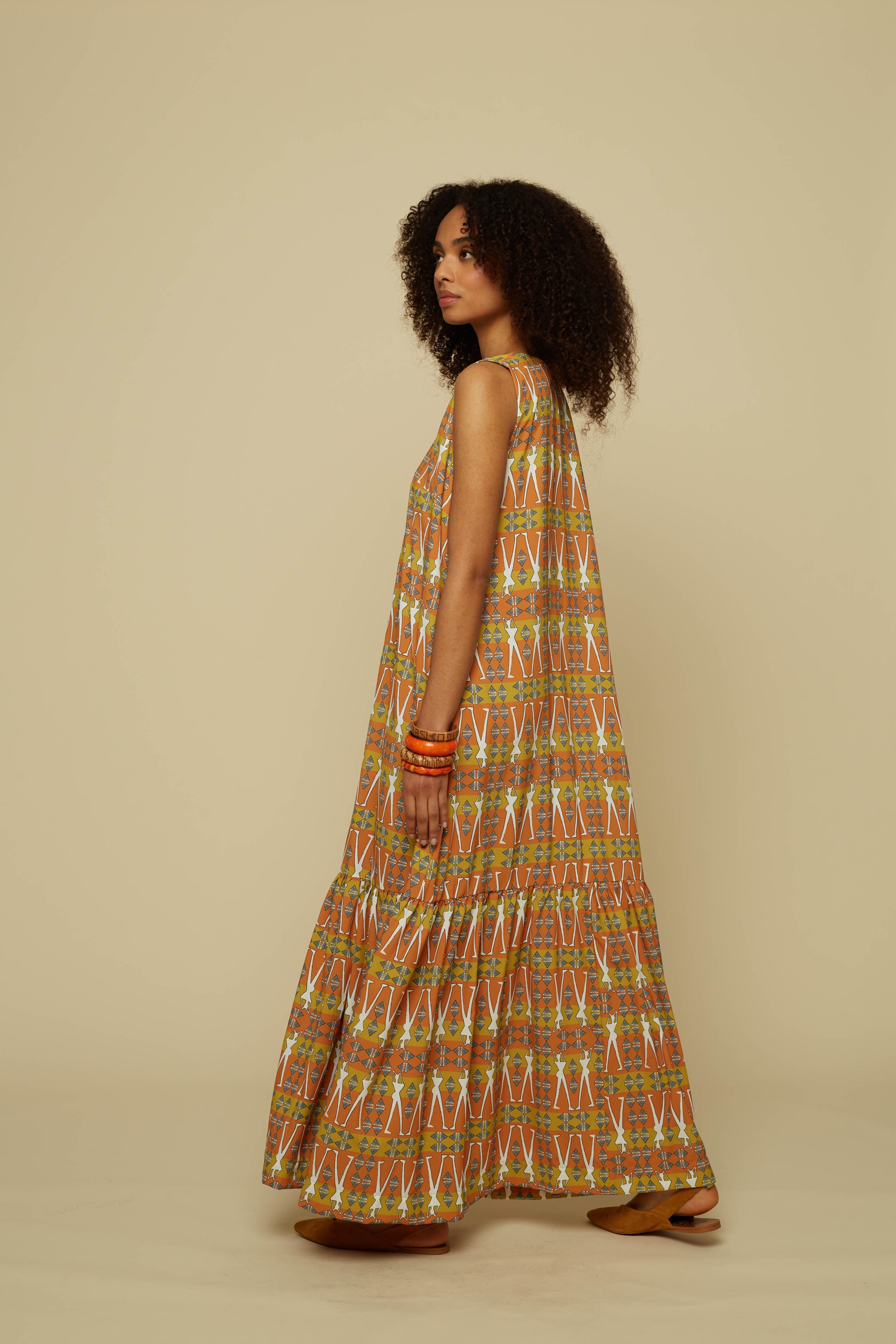 HENIOCHUS MAXI DRESS (BROWN GEO HUMAN FIGURE PRINT)