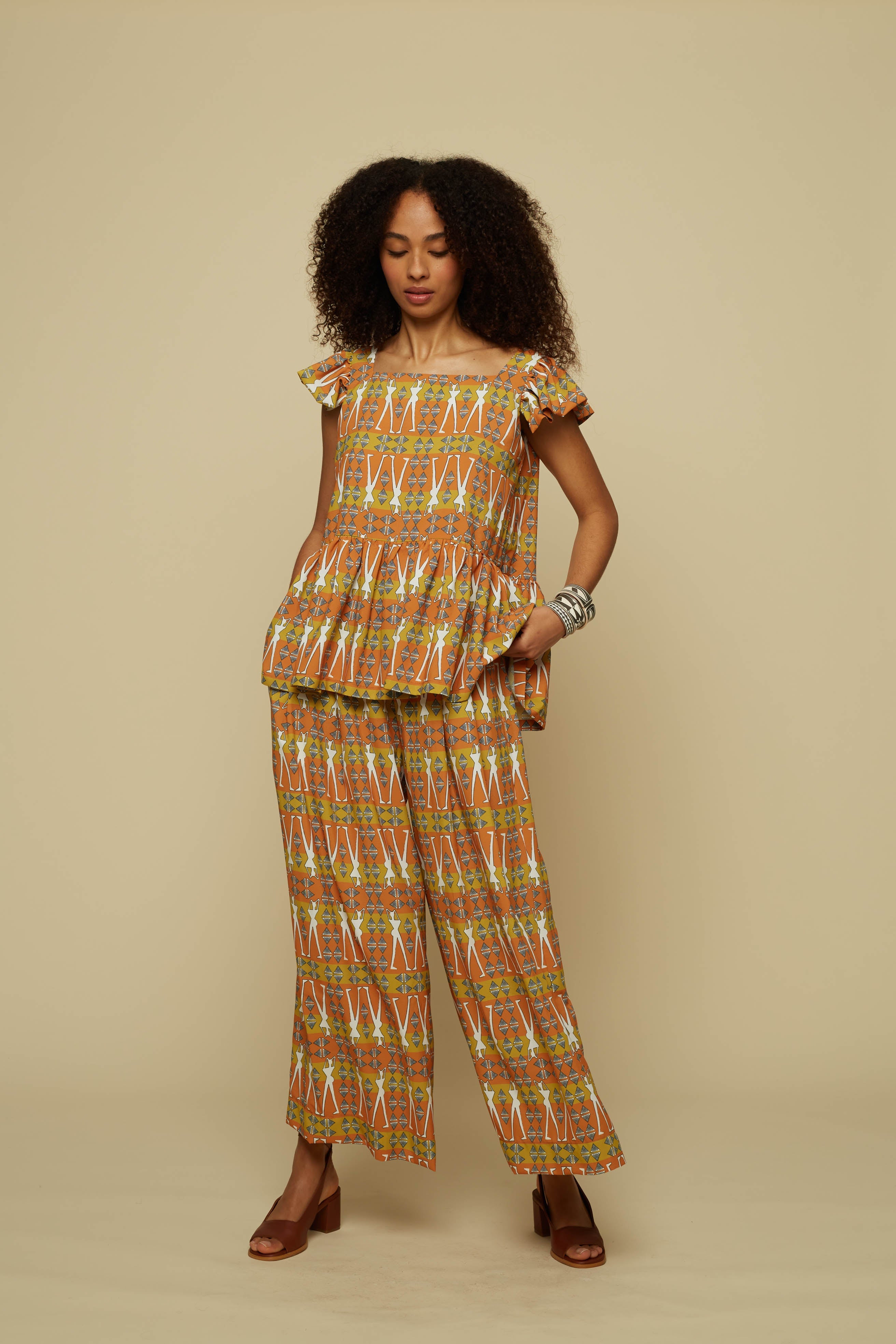KYKLOS TOP (BROWN GEO HUMAN FIGURE PRINT)