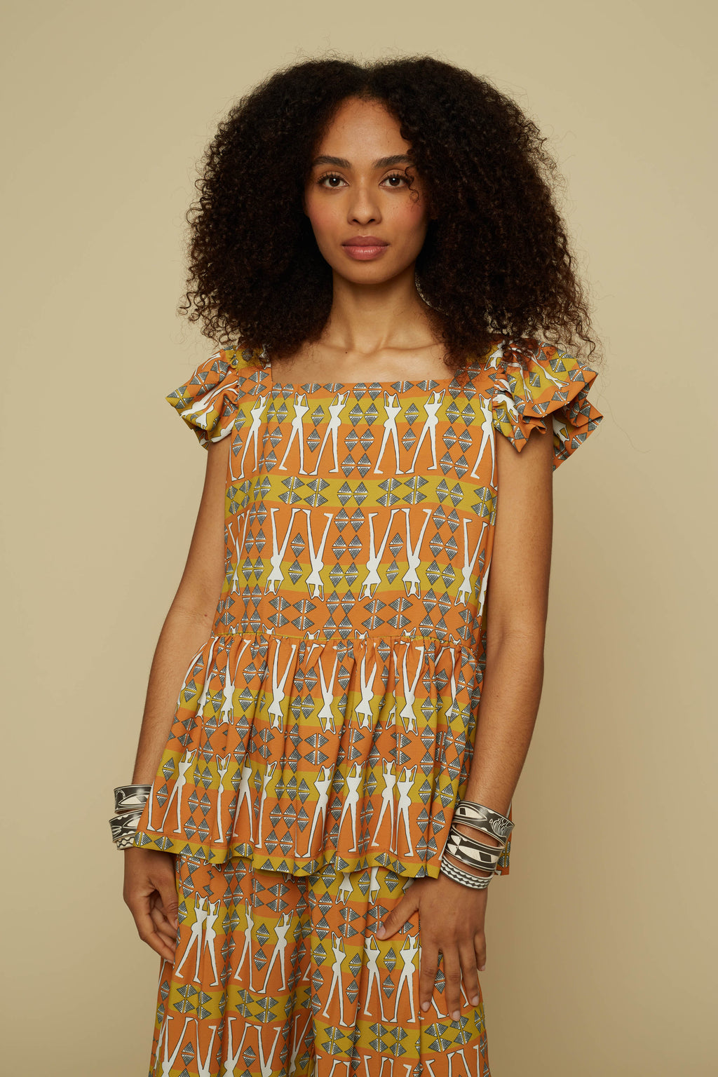 KYKLOS TOP (BROWN GEO HUMAN FIGURE PRINT)