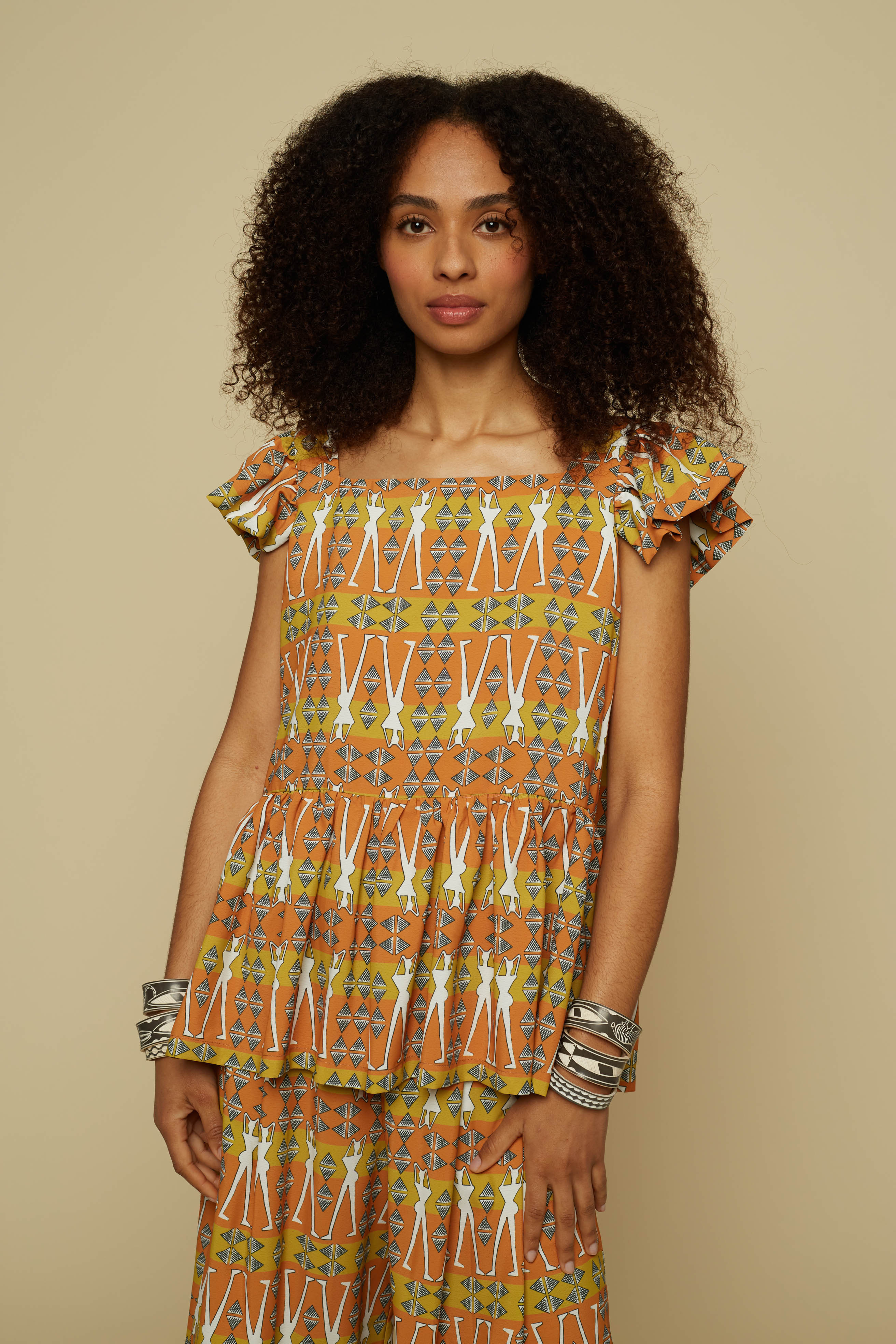 KYKLOS TOP (BROWN GEO HUMAN FIGURE PRINT)