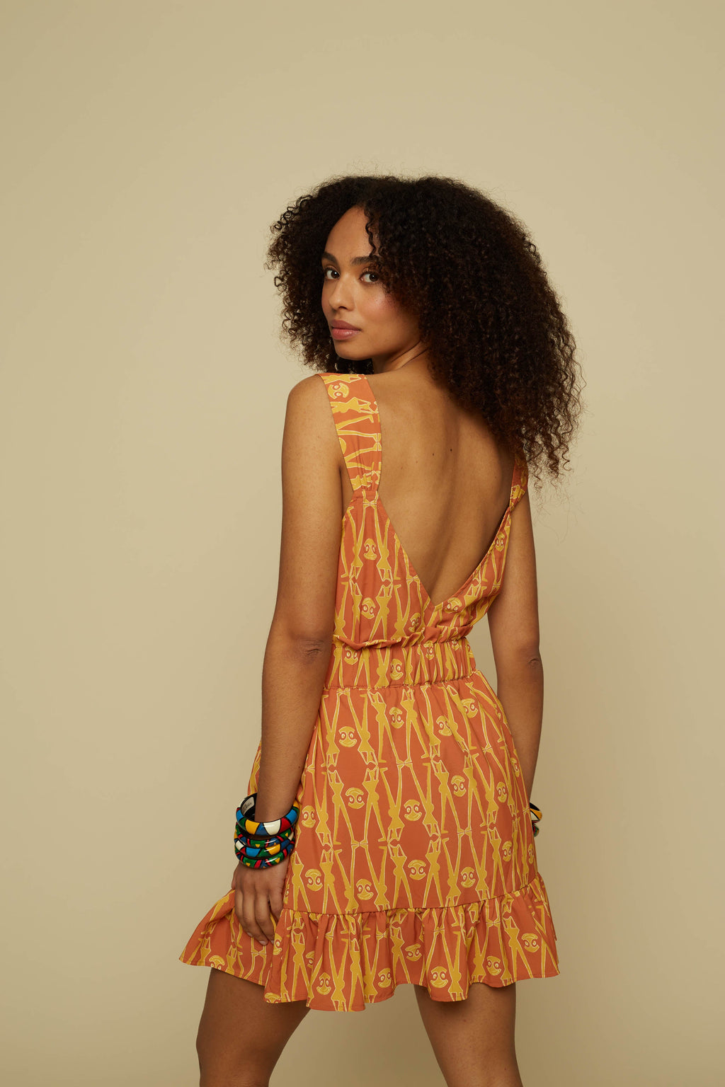 TECTON MINI SKIRT (BROWN GEO PEOPLE PRINT)